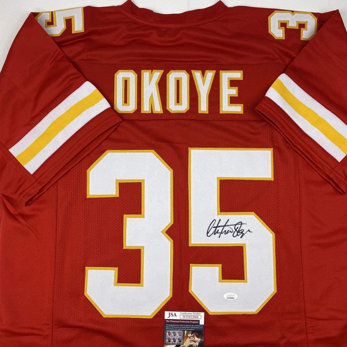 Autographed/Signed Christian Okoye Kansas City Red Football Jersey JSA COA