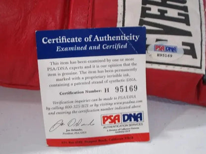 Montell Griffin Signed Boxing Glove (PSA DNA COA)